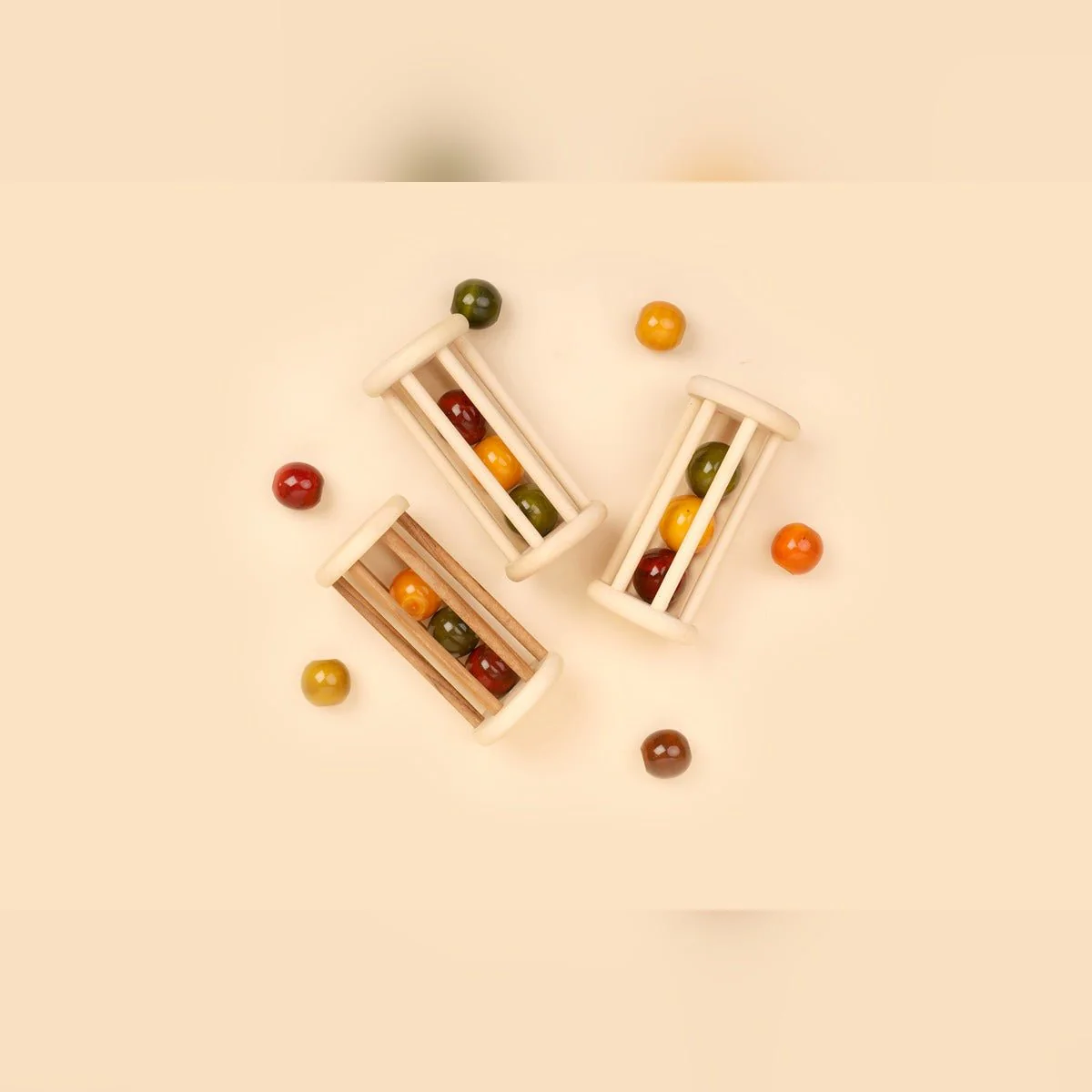 Natural Wooden Rolling Rattle – Organic Baby Toy - Image 4